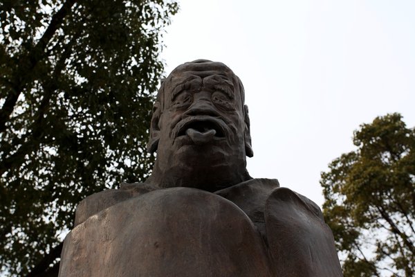 老子雕塑吐舌图片