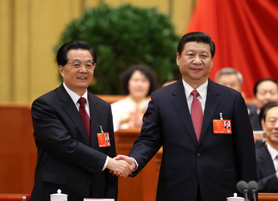2013年3月14日的习胡两代核心的握手照