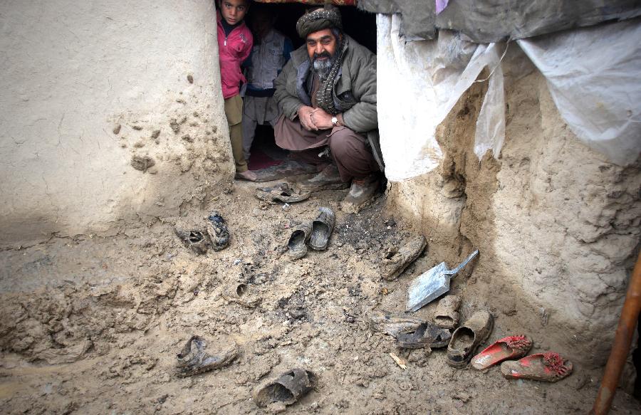 阿富汗首都雨后贫民窟(组图)