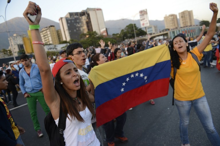 委内瑞拉学生游行抗议左翼政府暴力压迫