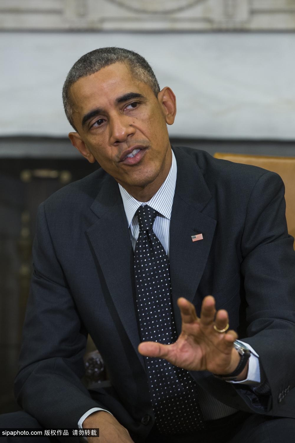 奥巴马会见应对埃博拉专员 并称加枪击案敲响警钟