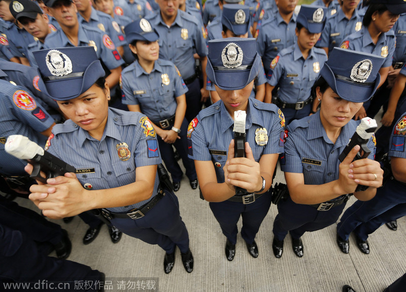 菲律宾警察举行“封枪仪式” 圣诞新年放走火 - 中文国际 - 中国日报网