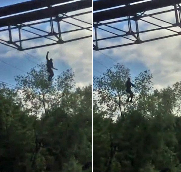 不作不死！俄男子悬挂铁道线高空玩自拍受伤