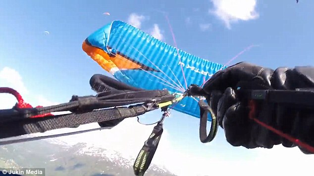 惊险！挪威跳伞运动员设备突发故障 险触高压电线