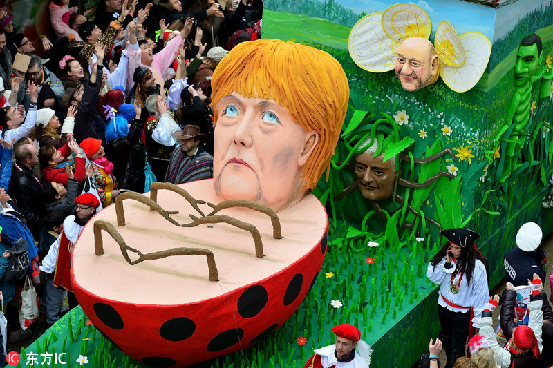 德国迎“玫瑰星期一”狂欢节 特朗普等政要遭讽刺恶搞