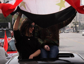 叙利亚民众举行游行支持政府