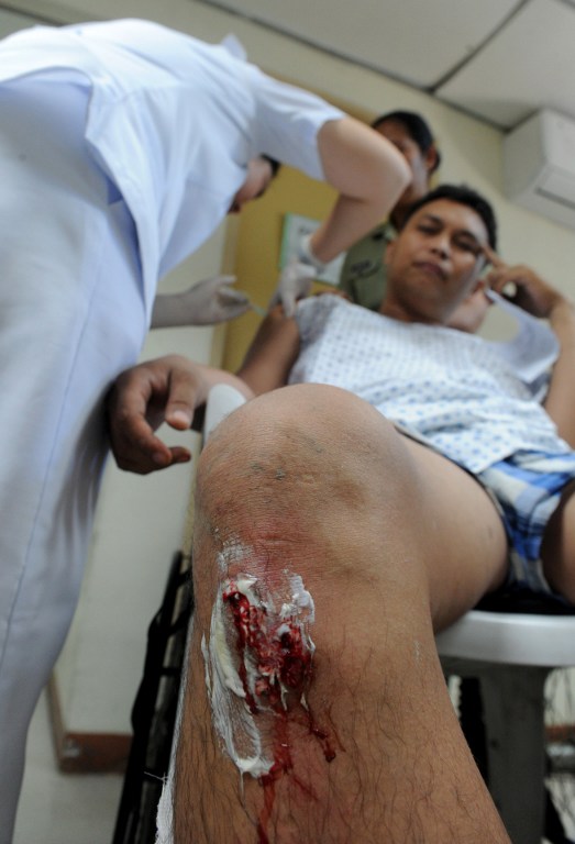 菲律宾军火库爆炸致至少23人伤 伤者军队医院接受治