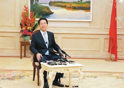 20年的检验足以作出有说服力的评判（紫荆绽放·人物专访）