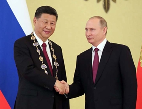 普京向习近平授予俄罗斯国家最高勋章