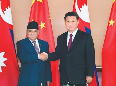 习近平会见尼泊尔共产党联合主席普拉昌达